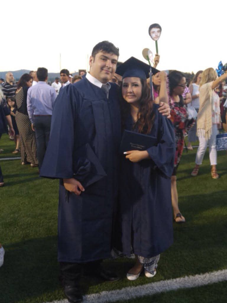 Esmeralda and Dominic celebrating a graduation
